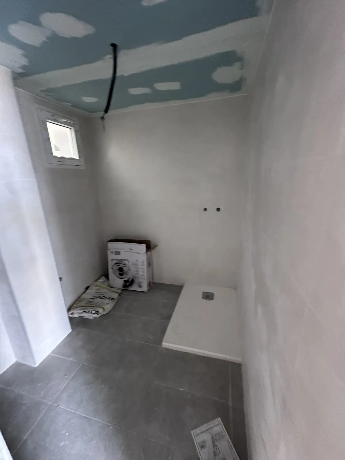 El baño, con su plato de ducha